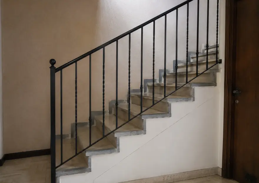 Escalier droit & quart tournant en fer forgé sur mesure